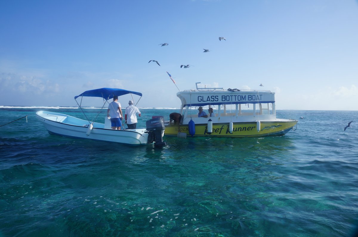 A glass-bottom boat on the water at San Pedro, Ambergris Caye, Belize