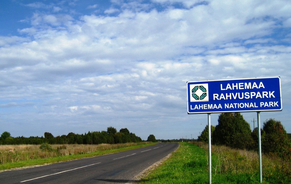 Blue roadside sign marking the entrance to Lahemaa National Park in Estonia