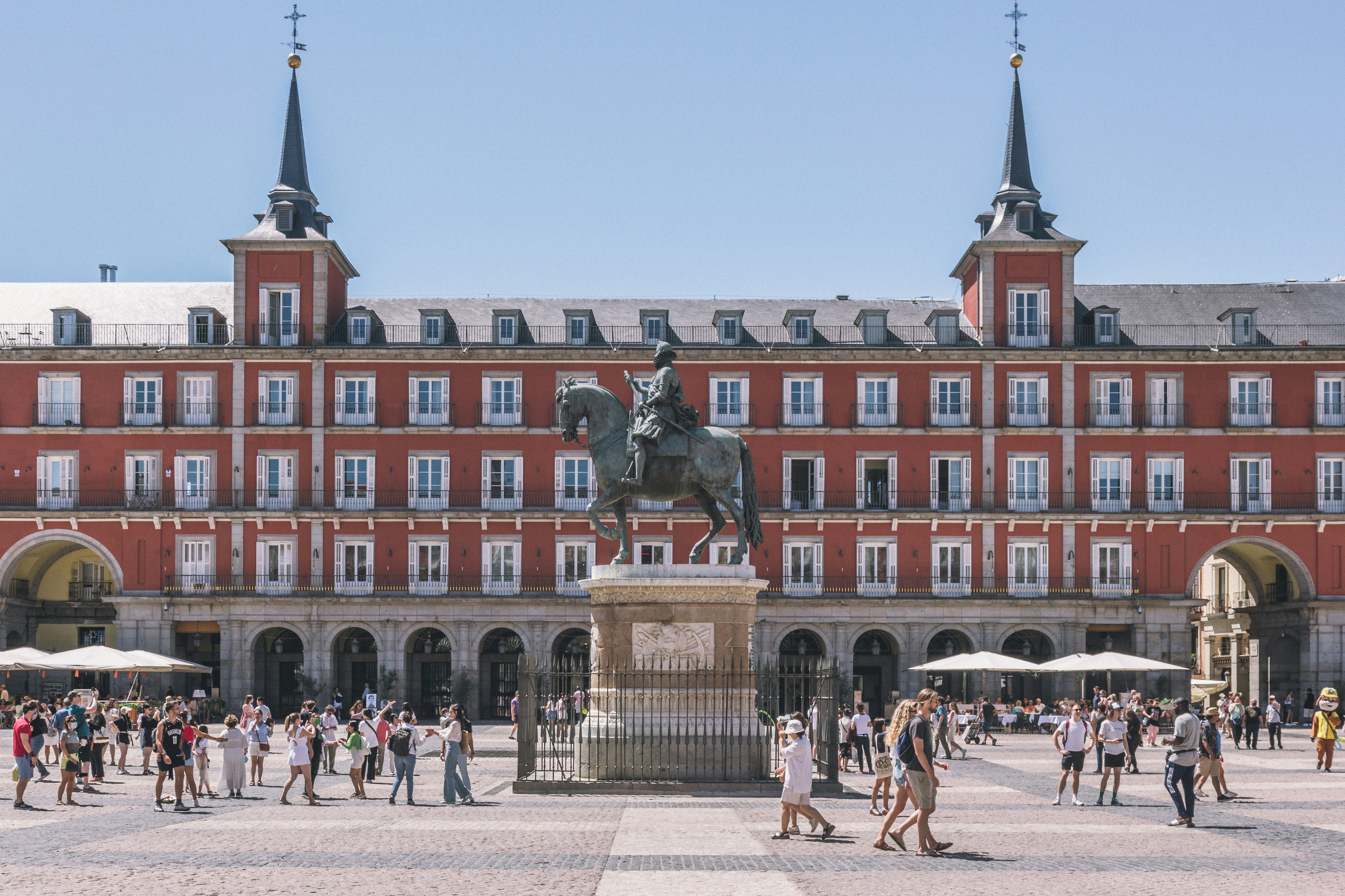 Plaza Mayor in Madrid with red buildings and open square