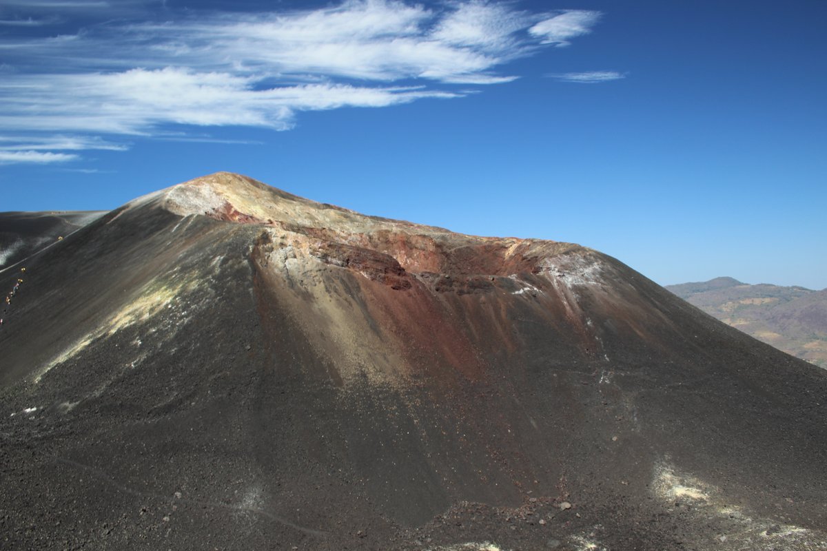 Dark volcanic cone of Cerro Negro near León, Nicaragua, known for volcano boarding