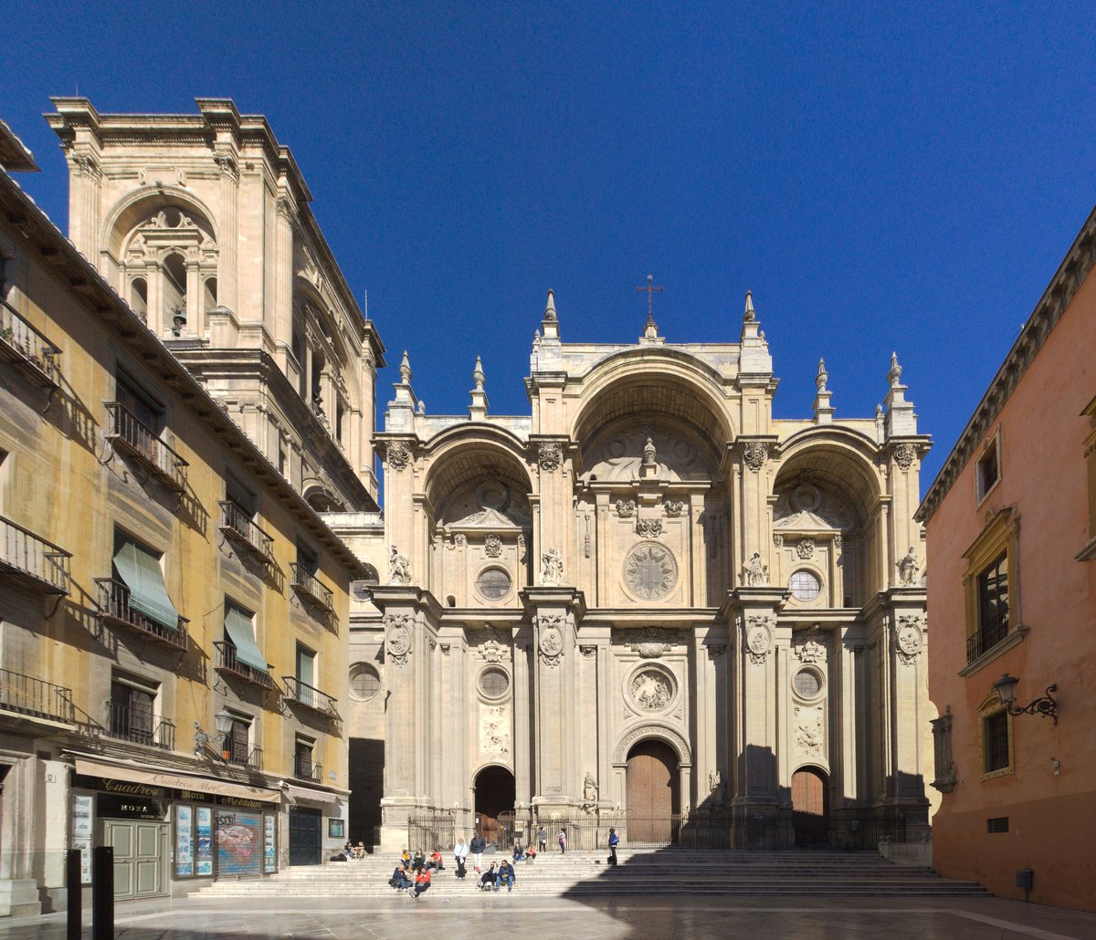 Bright yellow facade of Granada Cathedral overlooking the central square in Granada, Nicaragua