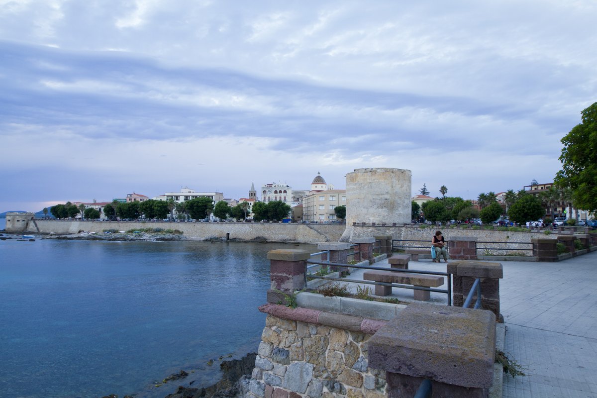 Narrow streets and historic buildings in Alghero’s compact medieval old town, Sardinia