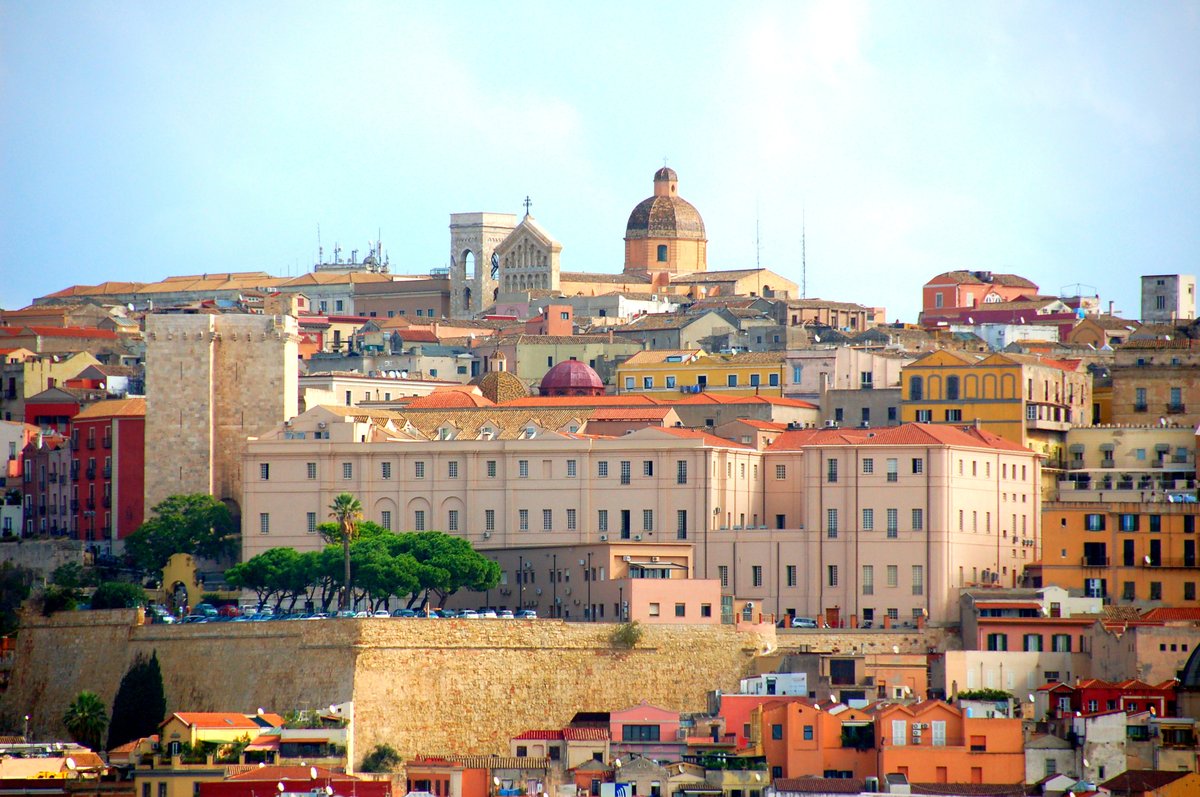 View across Cagliari’s hilltop Castello quarter with historic buildings and Mediterranean rooftops
