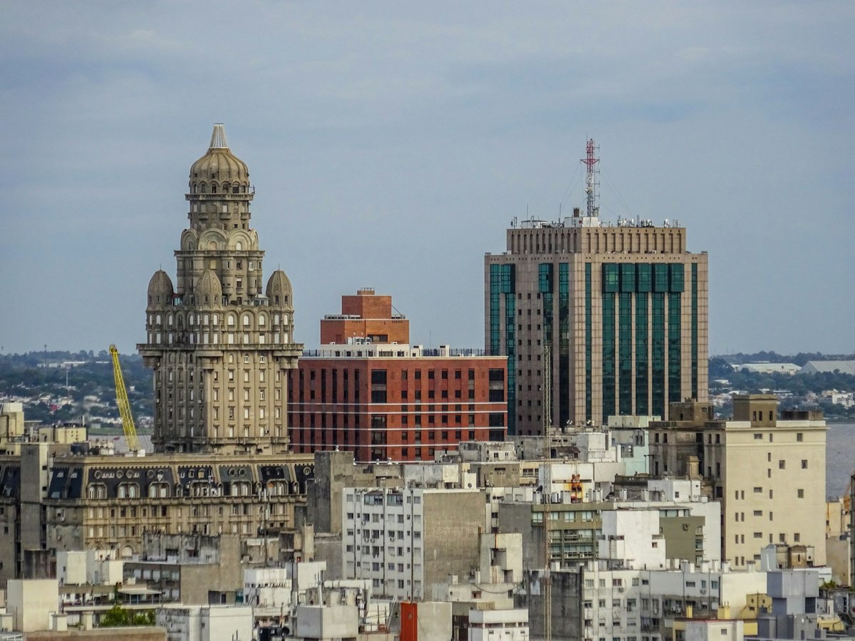 Montevideo skyline with the historic Palacio Salvo tower beside newer city buildings